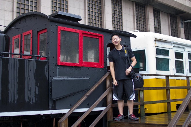 Fred and a very old train outside of Taipei Main Station.